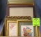 Box full of vintage picture frames some with artwork