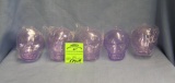 Group of hanging skull candy containers