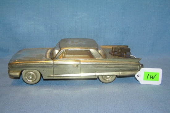 Cadillac cigarette holder and lighter