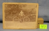Great early bicycle and rider photograph