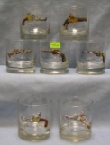 Collection of hand gun decorated drink glasses
