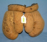 Pair of early leather boxing gloves