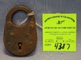 Antique brass padlock