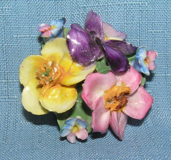 Hand painted porcelain floral pin made in England