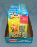 Box full of vintage PEZ Petz