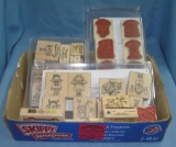 Box full of craft and decorative rubber stamps