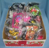 Box full of vintage fast food collectible toys