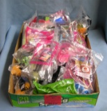 Box full of vintage fast food collectible toys