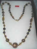 Quality costume jewelry necklace with amber beads