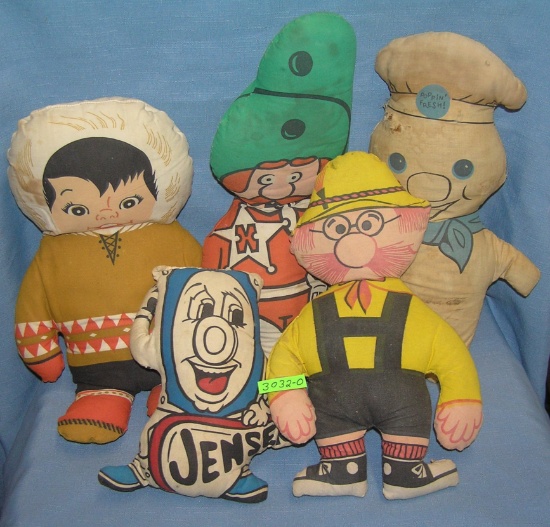 Group of vintage cartoon and advertising dolls