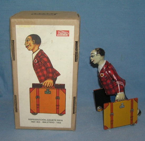 Paya Toys retro mechanical windup porter toy