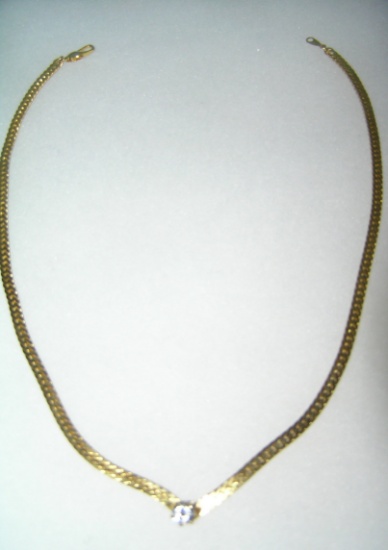 Quality gold tone necklace with simulated diamond stone