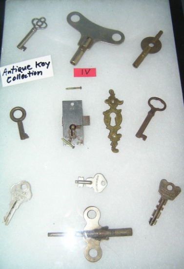 Collection of antique keys and cabinet lock