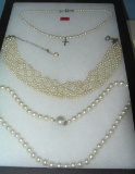 Group of vintage and costume jewelry pearl necklaces