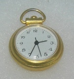 Gold toned pendant watch