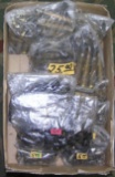 Large box full of empty brass ammo, metal clips and more