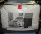 Large bag full of bedding, comforters and more