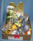 Box full of vintage fast food collectible toys