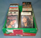Box full of vintage musical cassette tapes