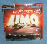 Cast metal limousine mint on card