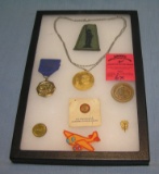 Group of vintage pins, medals and patches
