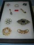 Collection of vintage costume jewelry pins