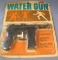 Secret Agent style water gun 1960's mint on card