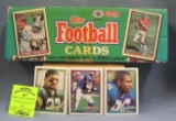 Box full of 1991 Topps Football cards