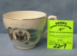 English maid souvenir cup from Maine