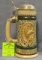 Vintage porcelain beer stein with hunting and fishing theme