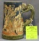 Early German beer stein with dragon handle