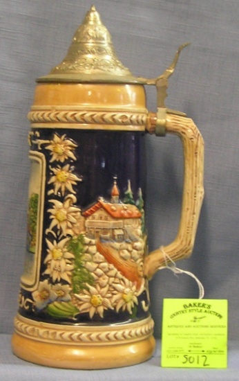 Vintage German beer stein with pewter lid