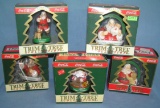 Collection of Coca Cola Santa Claus Christmas ornaments