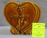 Western themed souvenir wall pocket from Colorado