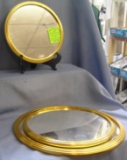 Group of three gold framed vanity framed mirrors