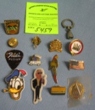 Group of vintage collectible pins and more
