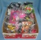 Box full of vintage fast food collectible toys