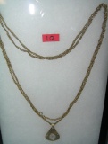 Quality gold tone Caravelle double strand ladies' pendant watch