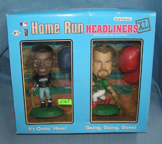 K. Griffey Jr. and M. McGwire bobble head dolls