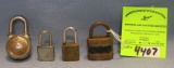 Group of four vintage padlocks