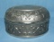 Oval shaped decorated cast metal jewelry box