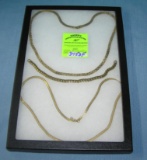 Group of gold plated necklaces and bracelet