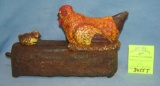 Cast iron mother and hen mechanical bank