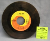 Vintage Beatles 45 rpm record by Capital Records
