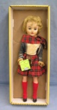 Vintage vinyl plaid stamp girl doll
