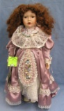 Vintage porcelain doll by Seymour Man Co.