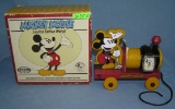 Mickey Mouse Fossil wrist watch and wood train
