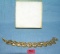 High quality signed napier gold toned bracelet