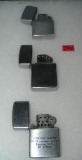 Collection of vintage lighters includes Zippo