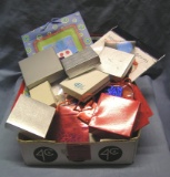 Box full of gift bags, jewelry boxes, party supplies and more